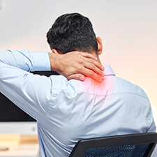 man with neck pain