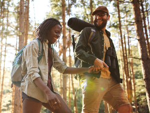 man and woman hiking outdoors