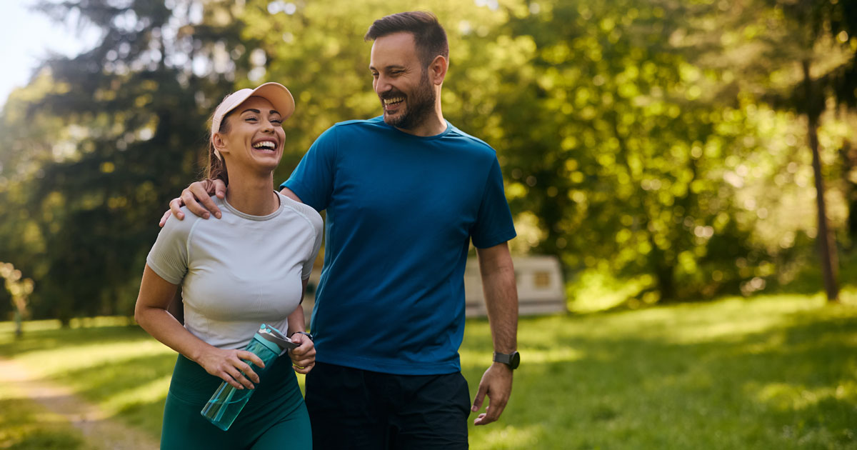 Couple walking and laughing