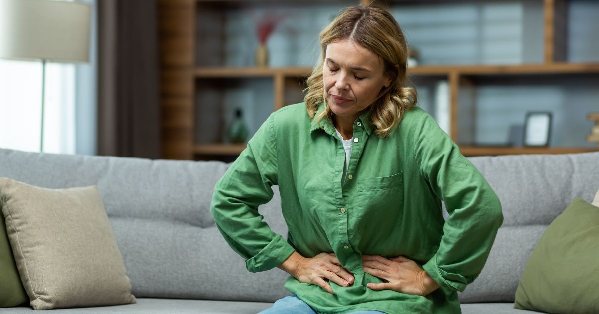 Woman with stomach pain.