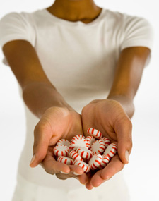Woman holding a bunch of mints