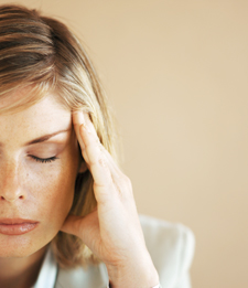 Woman holding her head