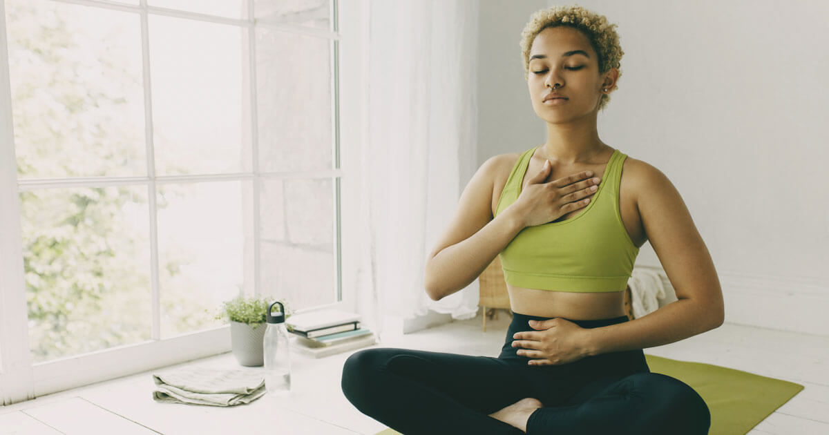 woman practicing deep breathing