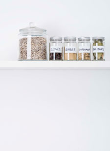 Canisters in a kitchen cabinet