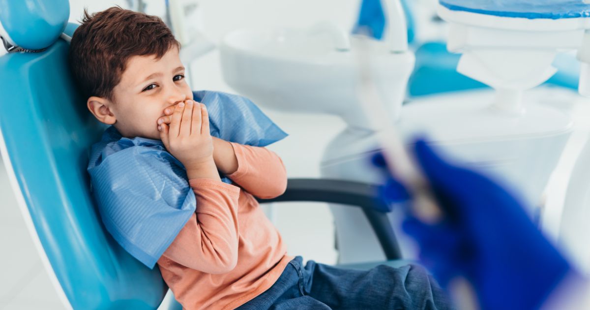 Kid at the dentist.