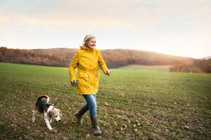 woman walking dog