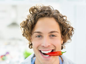 man with chili pepper