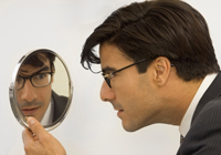 Man looking in mirror