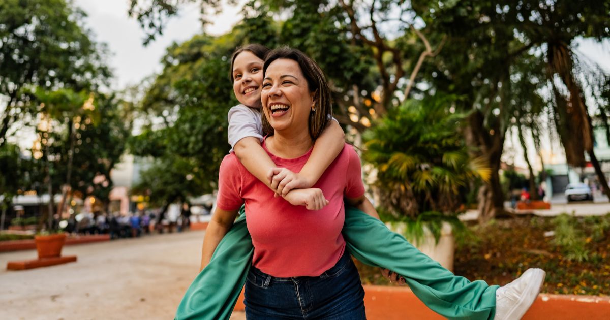 Mom and daughter walking.