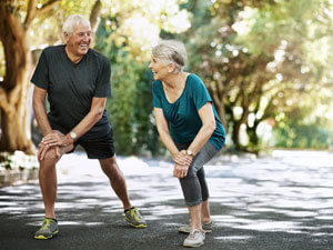 Older couple stretching