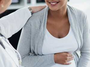 pregnant woman at dentsit