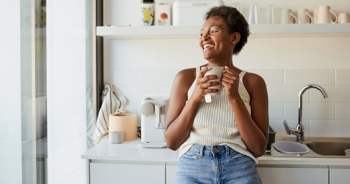 Woman drinking coffee.