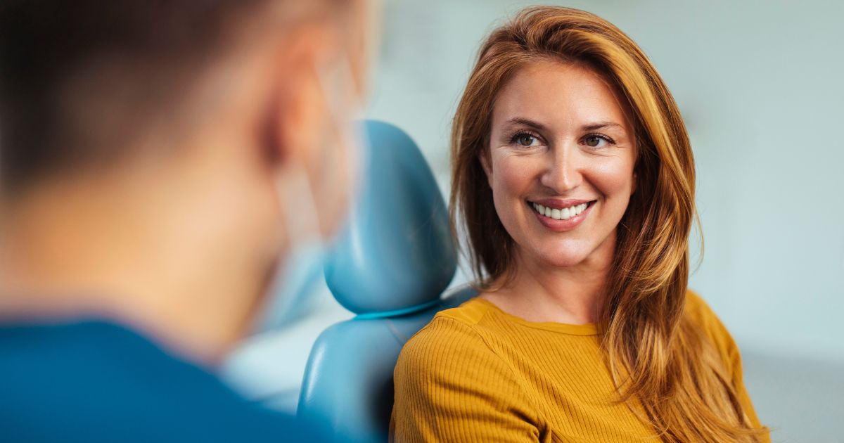 Woman in dental chair.