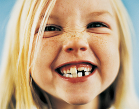 Portrait of a young girl with gappy teeth