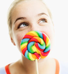 Teenager with lollipop