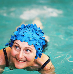 Smiling senior woman in pool