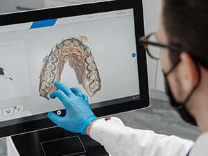 dentist reviewing oral scan