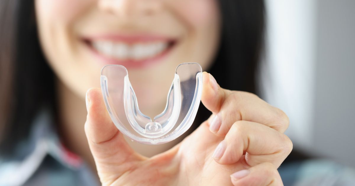 Woman with mouthguard