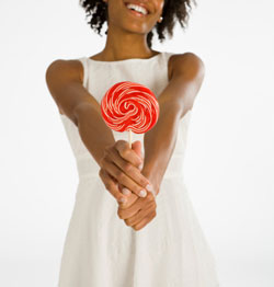 Lady holding a lollipop
