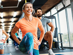 woman and man furing a class at the gym