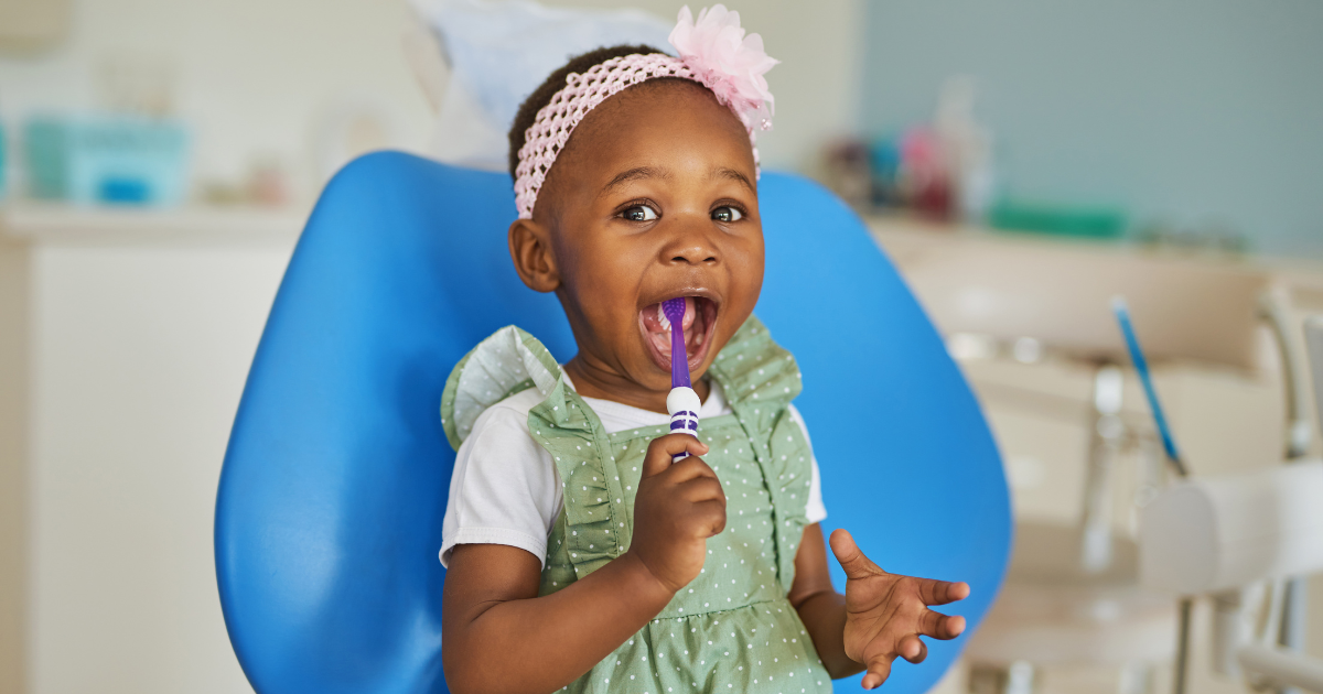 Toddler brushing teeth.