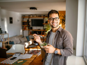 man having healthy lunch