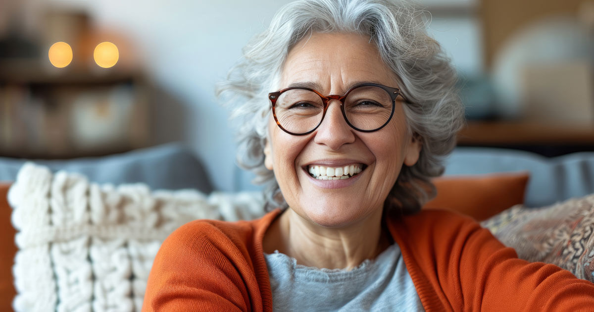 woman with white hair smiling