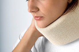 Unhappy woman in cervical collar