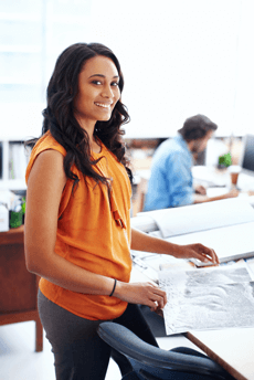 woman standing at desk