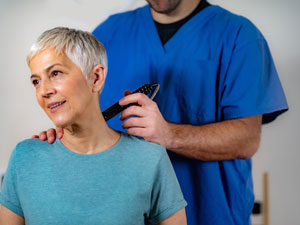 Woman getting laser therapy