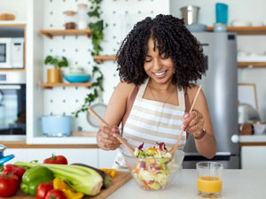 Woman preparing salad