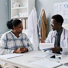 woman talking to her doctor