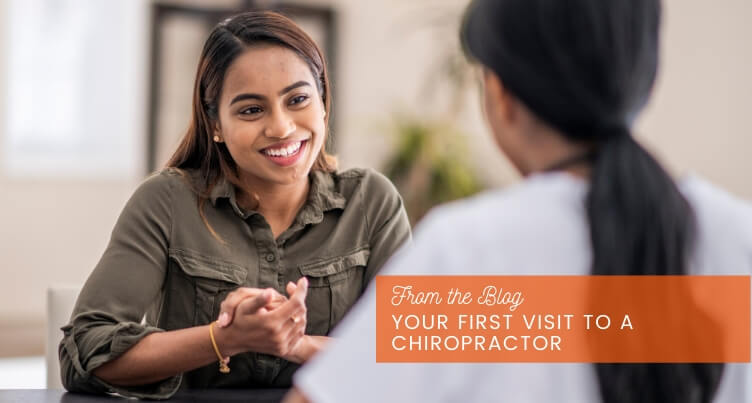 Woman speaking with doctor.