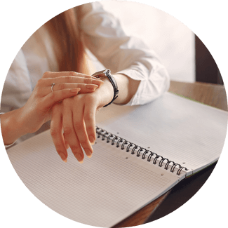 Woman looking at her watch