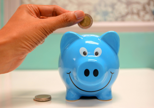 someone-putting-money-into-savings