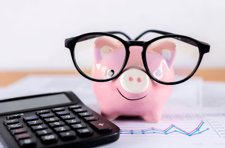 Piggy bank wearing glasses