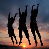 Three people jumping