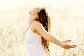 Happy woman in field