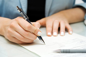 Woman filling out paperwork