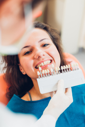 female with tooth whitening chart