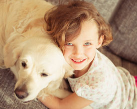 Girl Hugging Dog