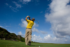 Man playing golf