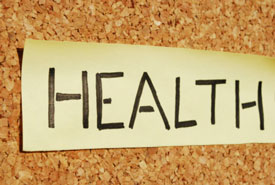 cork board with the word health on it