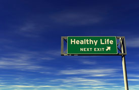 Sign saying Healthy Life Next Exit