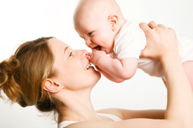 Joyful mom with baby