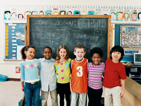 Children standing in classroom