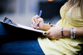 Woman filling out paperwork