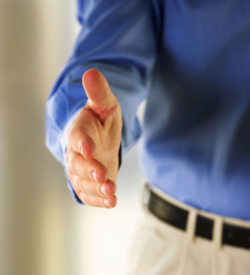 Man holding out his hand to shake hands