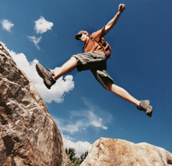Man jumping on mountain