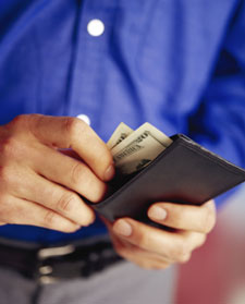 Man pulling money from wallet